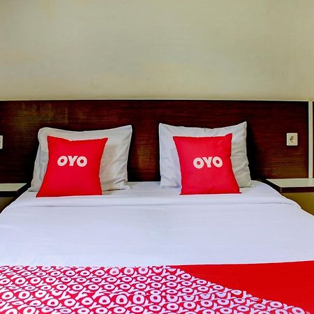 Oyo 90162 Remboelan Guest House Sungai Lutus Bagian luar foto