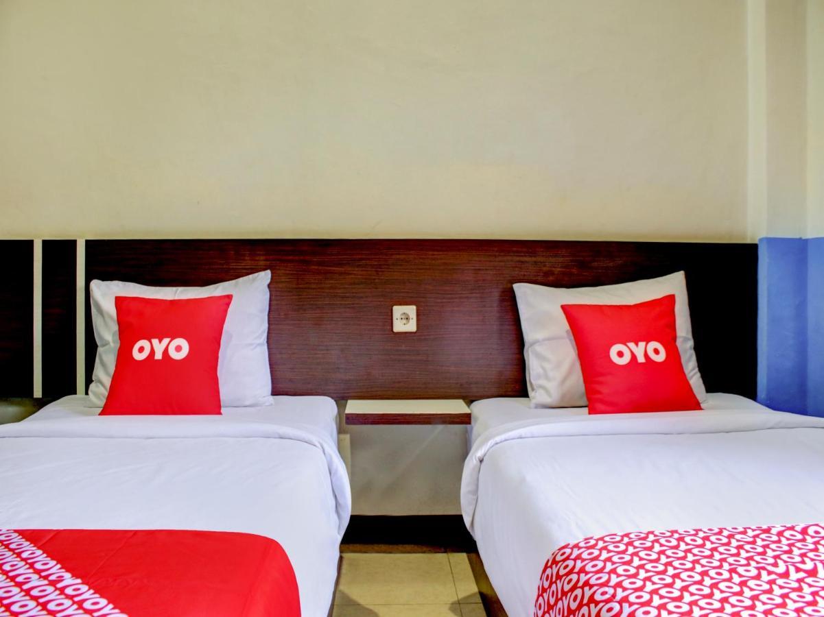 Oyo 90162 Remboelan Guest House Sungai Lutus Bagian luar foto