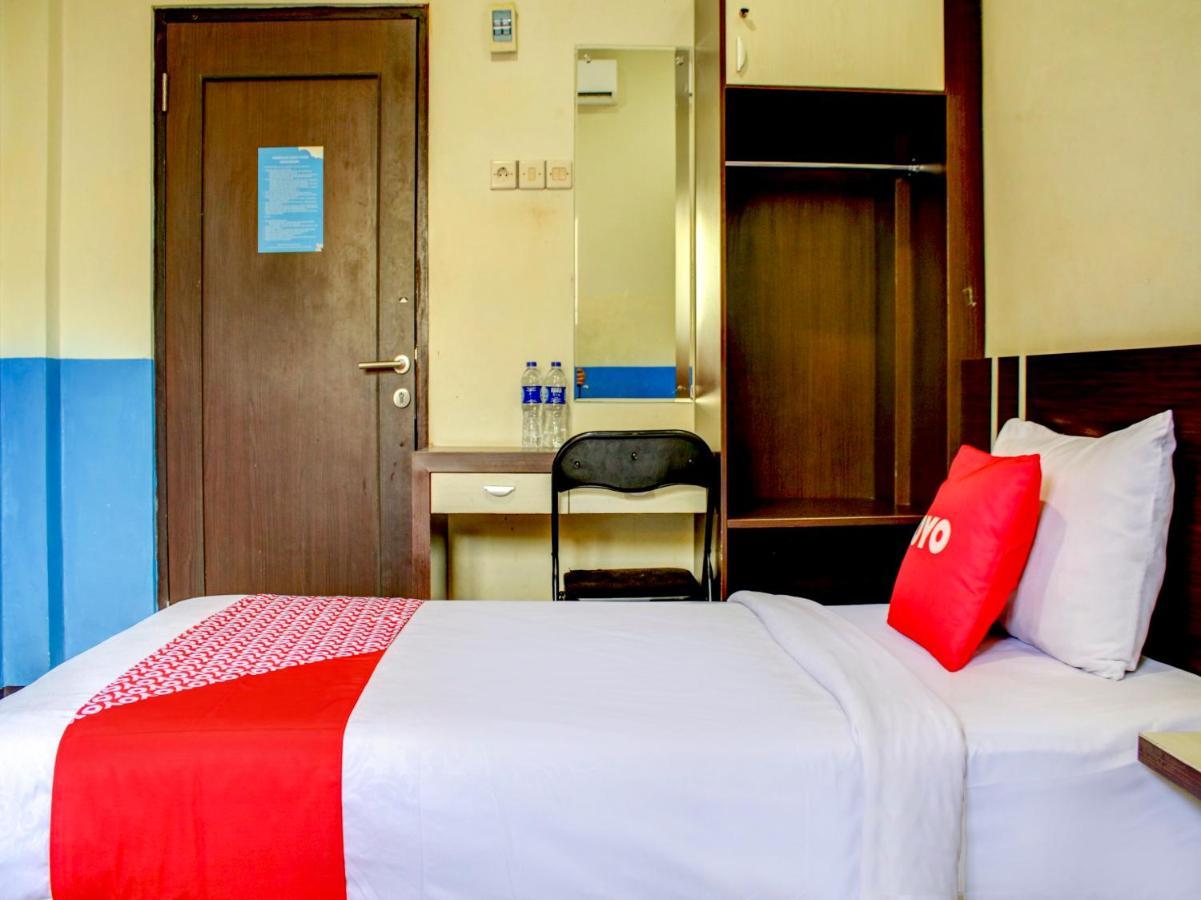 Oyo 90162 Remboelan Guest House Sungai Lutus Bagian luar foto