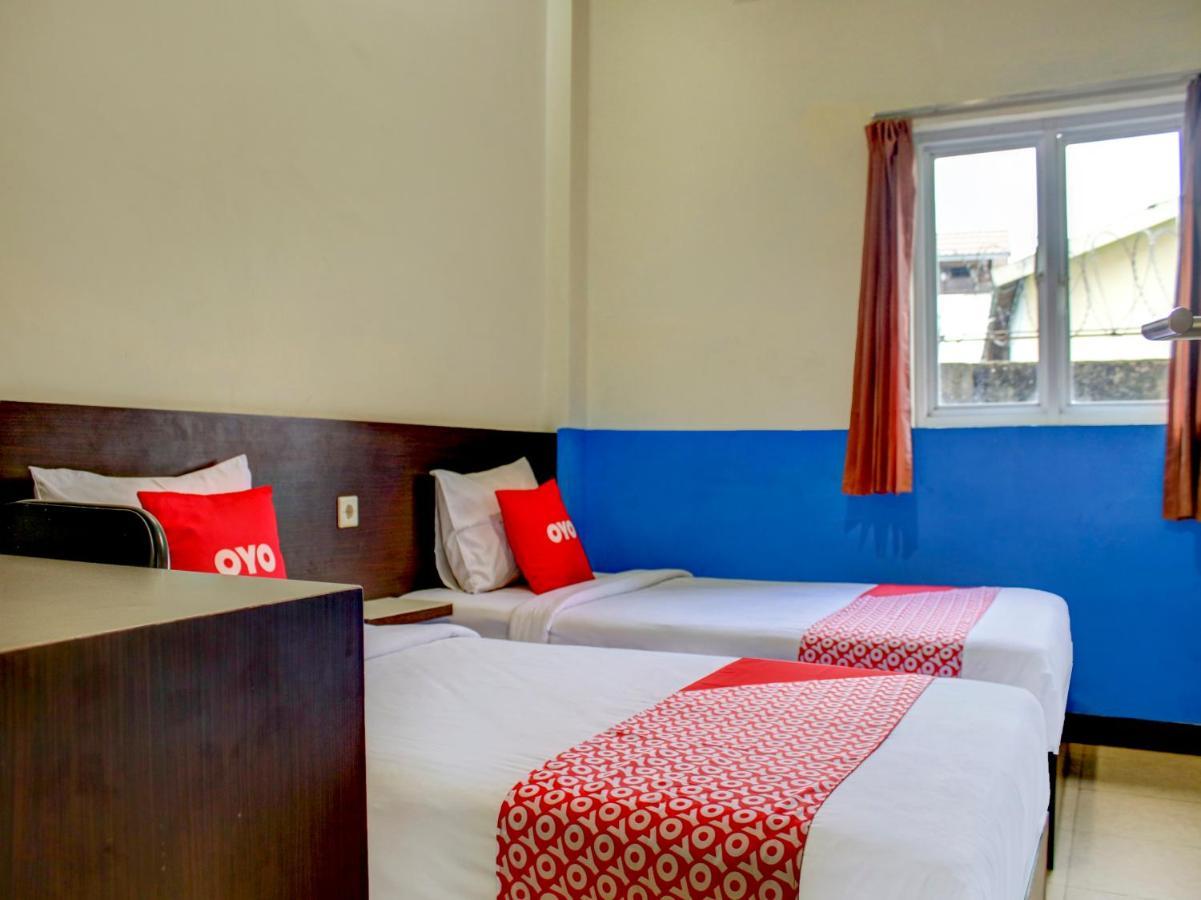 Oyo 90162 Remboelan Guest House Sungai Lutus Bagian luar foto