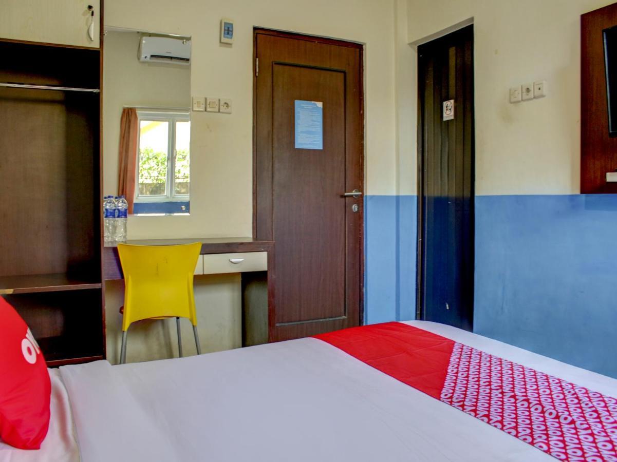 Oyo 90162 Remboelan Guest House Sungai Lutus Bagian luar foto