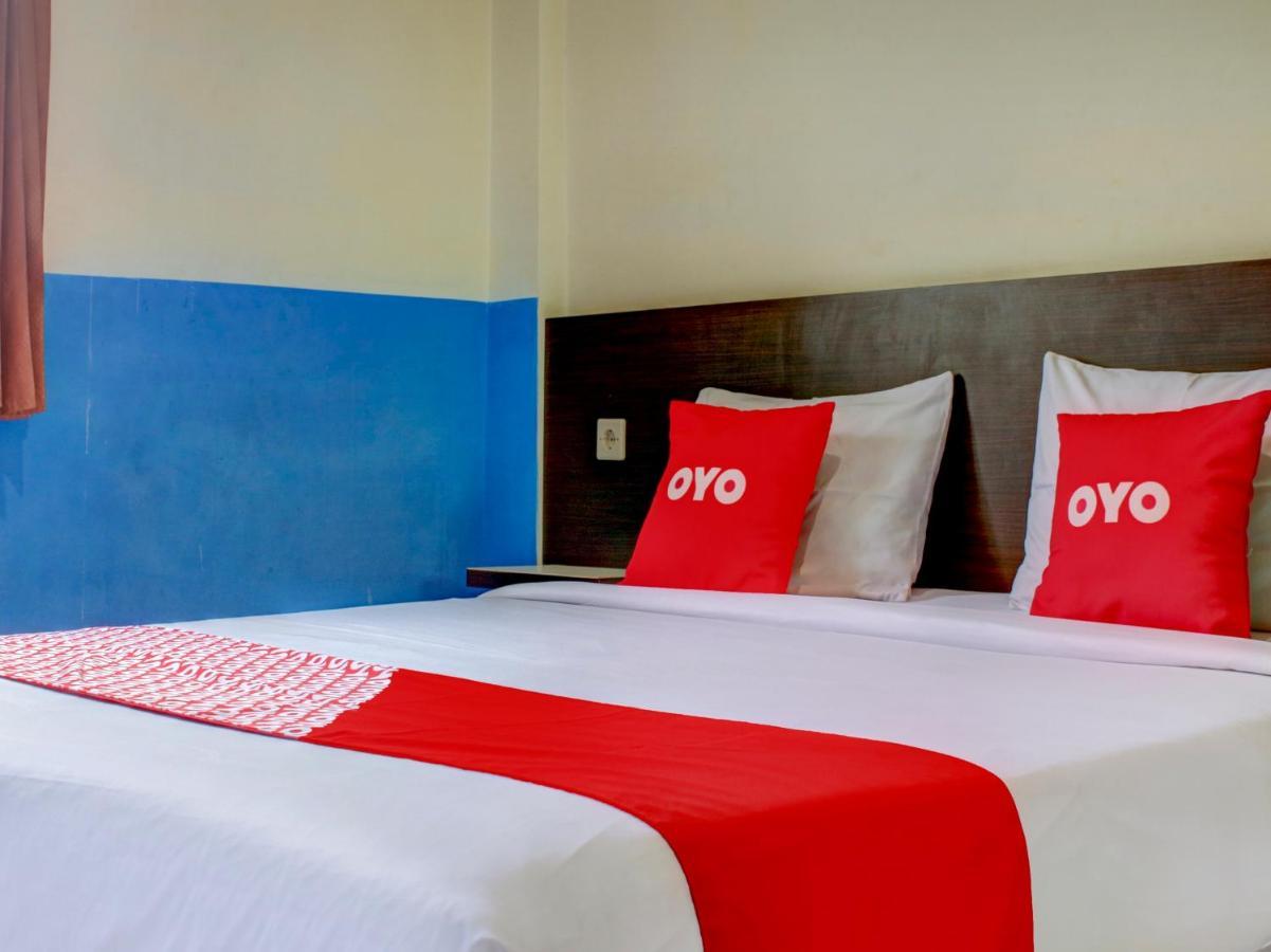 Oyo 90162 Remboelan Guest House Sungai Lutus Bagian luar foto