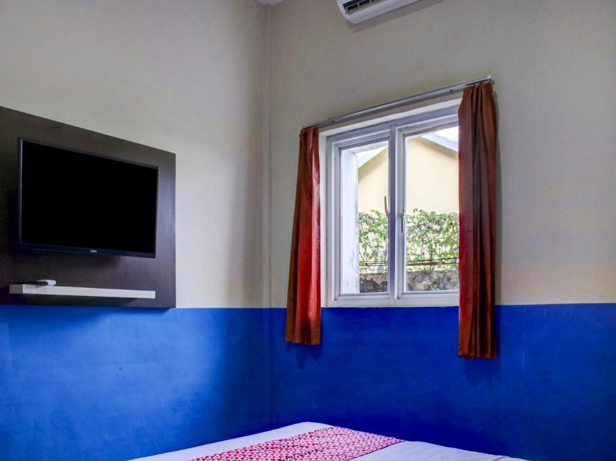 Oyo 90162 Remboelan Guest House Sungai Lutus Bagian luar foto