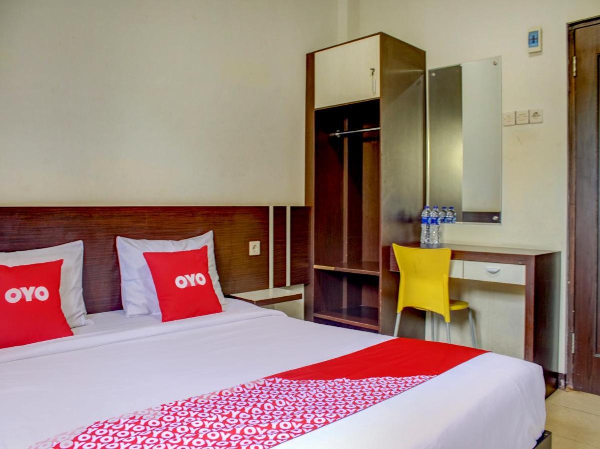 Oyo 90162 Remboelan Guest House Sungai Lutus Bagian luar foto