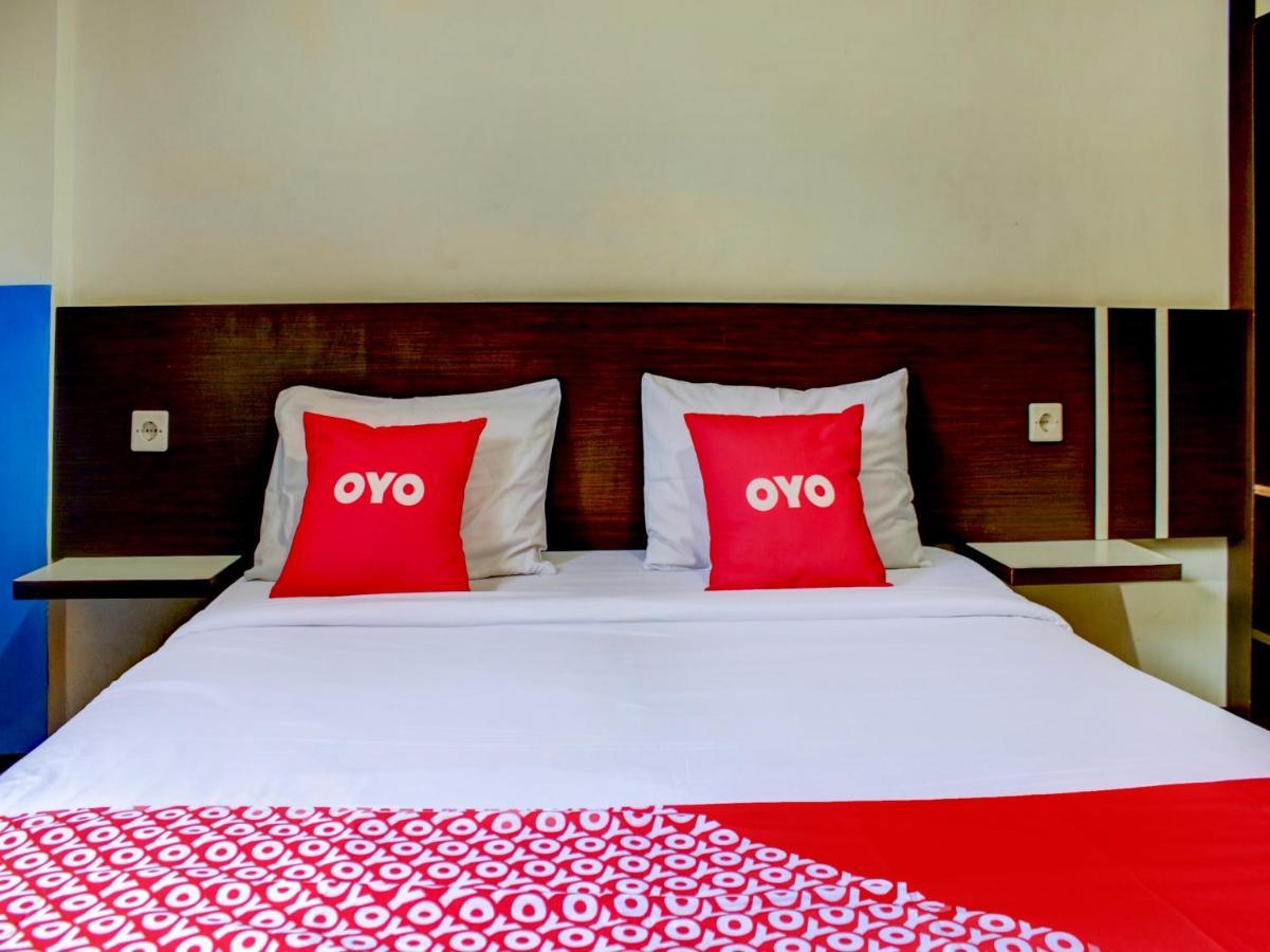 Oyo 90162 Remboelan Guest House Sungai Lutus Bagian luar foto